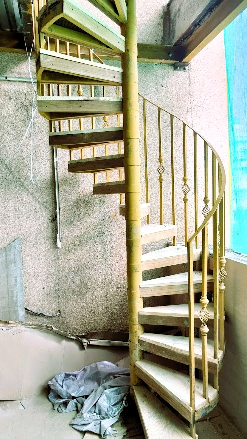 Outdoor metal staircase with railings
